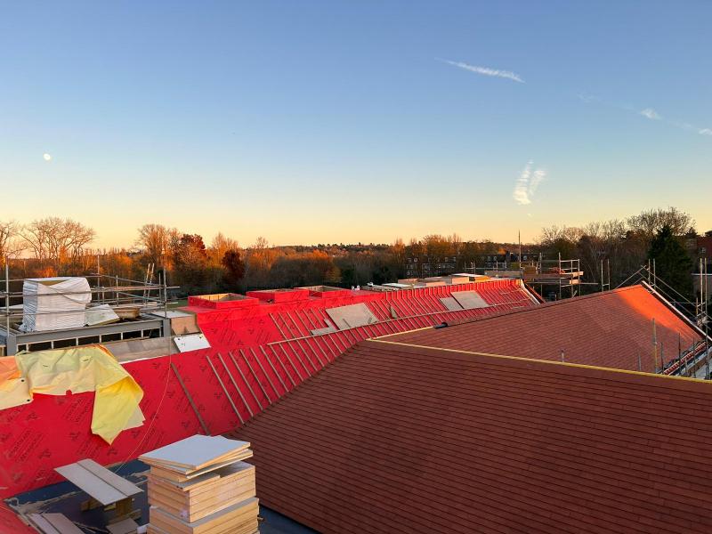 Large wooden school roof construction